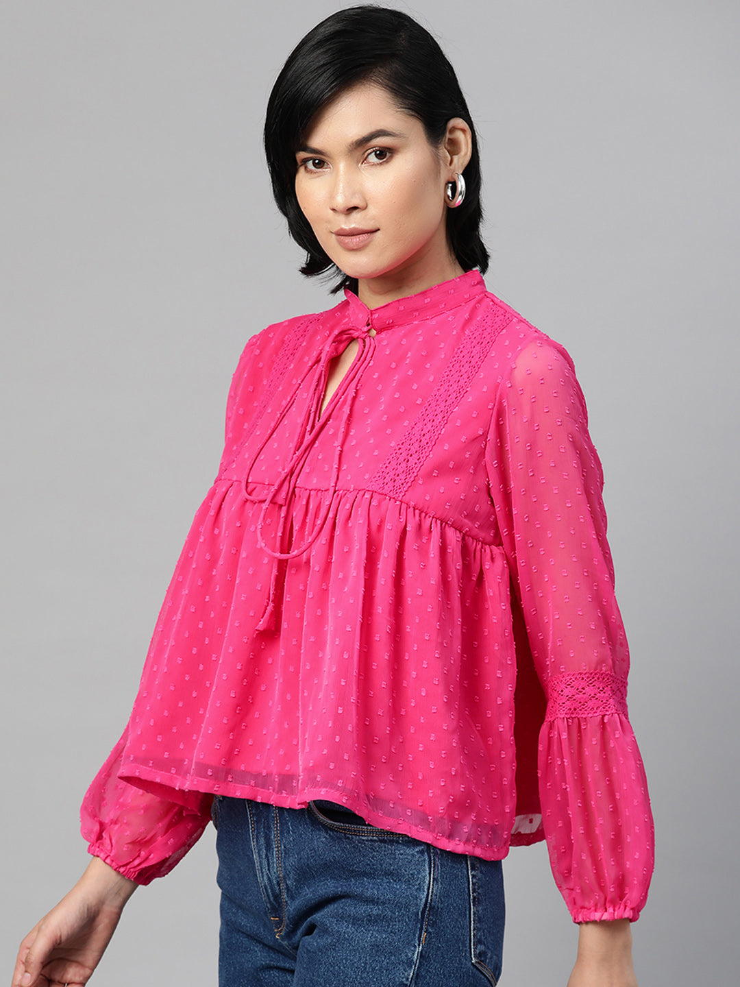 plusS Pink Self Design Tie-Up Neck Bishop Sleeves Georgette Cinched Waist Top