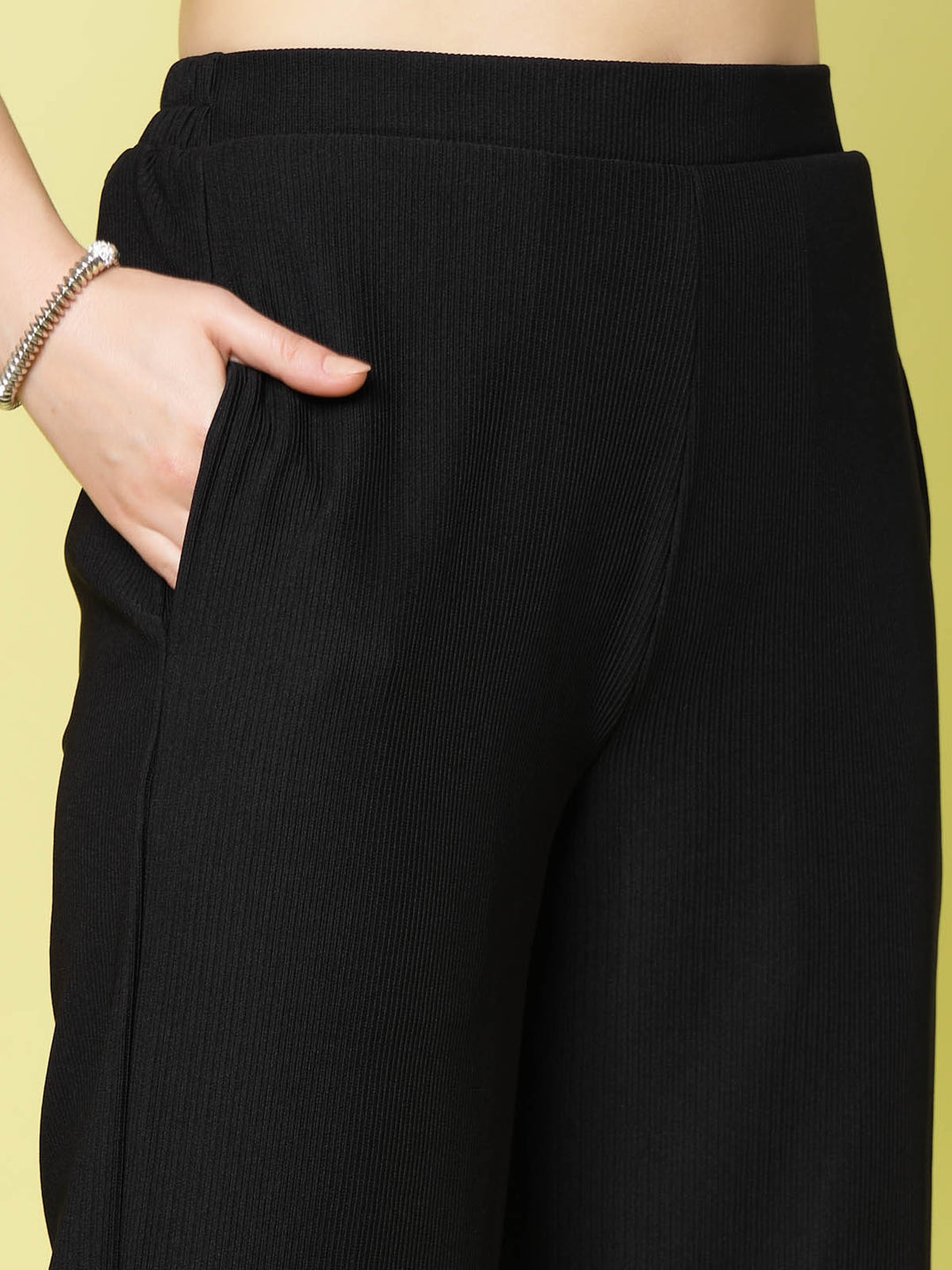 Women Black Solid Parallel Trousers