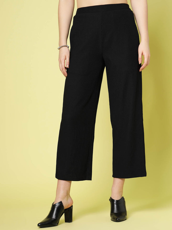 Women Black Solid Parallel Trousers