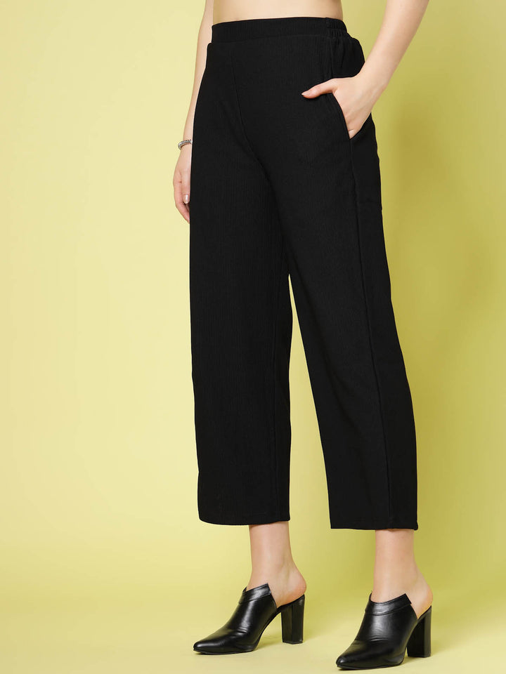 Women Black Solid Parallel Trousers