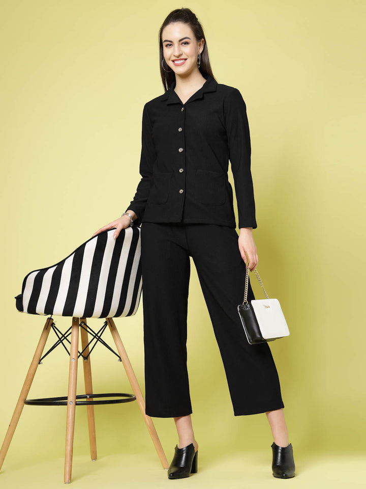 Women Black Solid Parallel Trousers