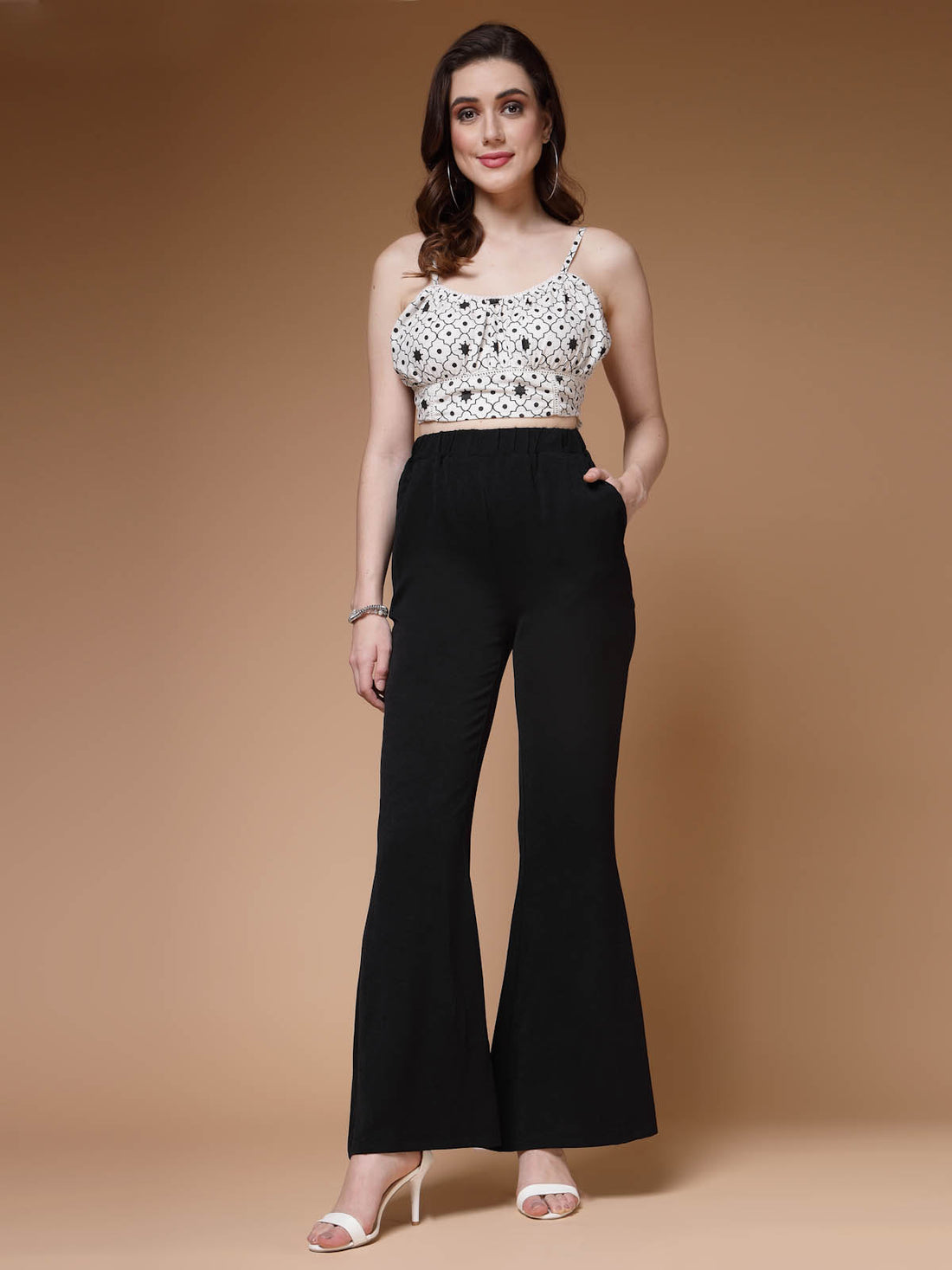 Women Black Mid Rise Plain Bootcut Trousers