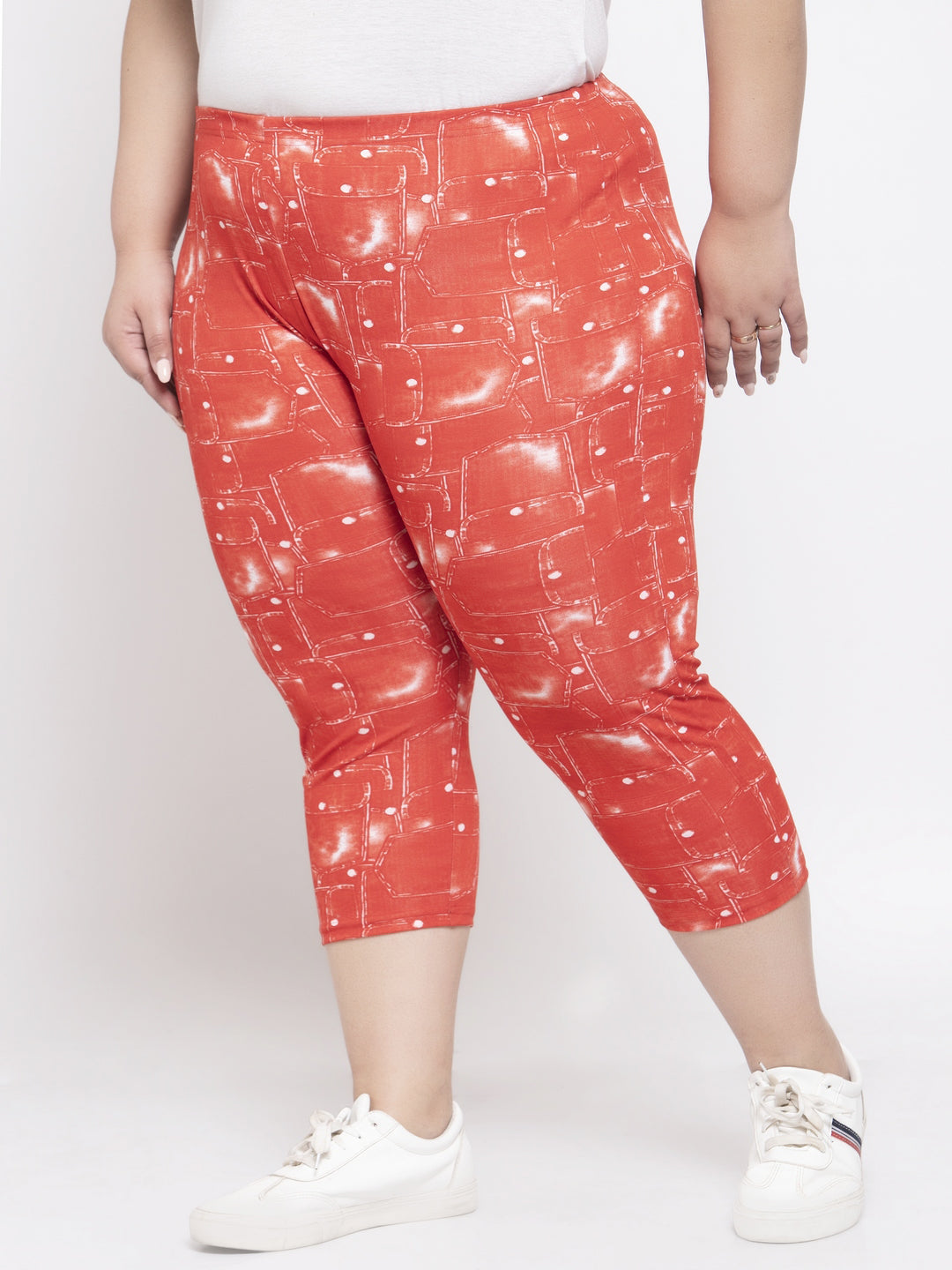 Women Orange & White Printed Tight Fit Capris