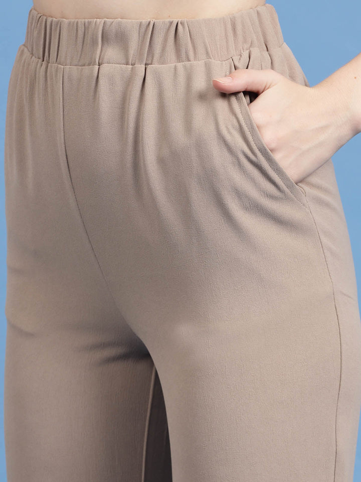 Women Beige Mid Rise Plain Bootcut Trousers