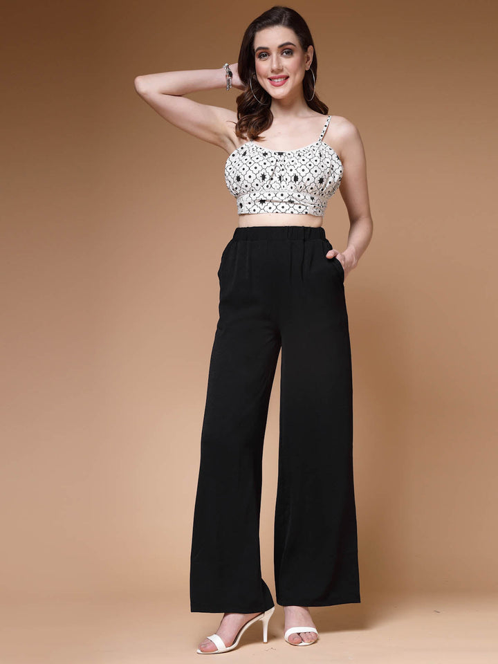 Women Black Mid Rise Plain Parallel Trousers