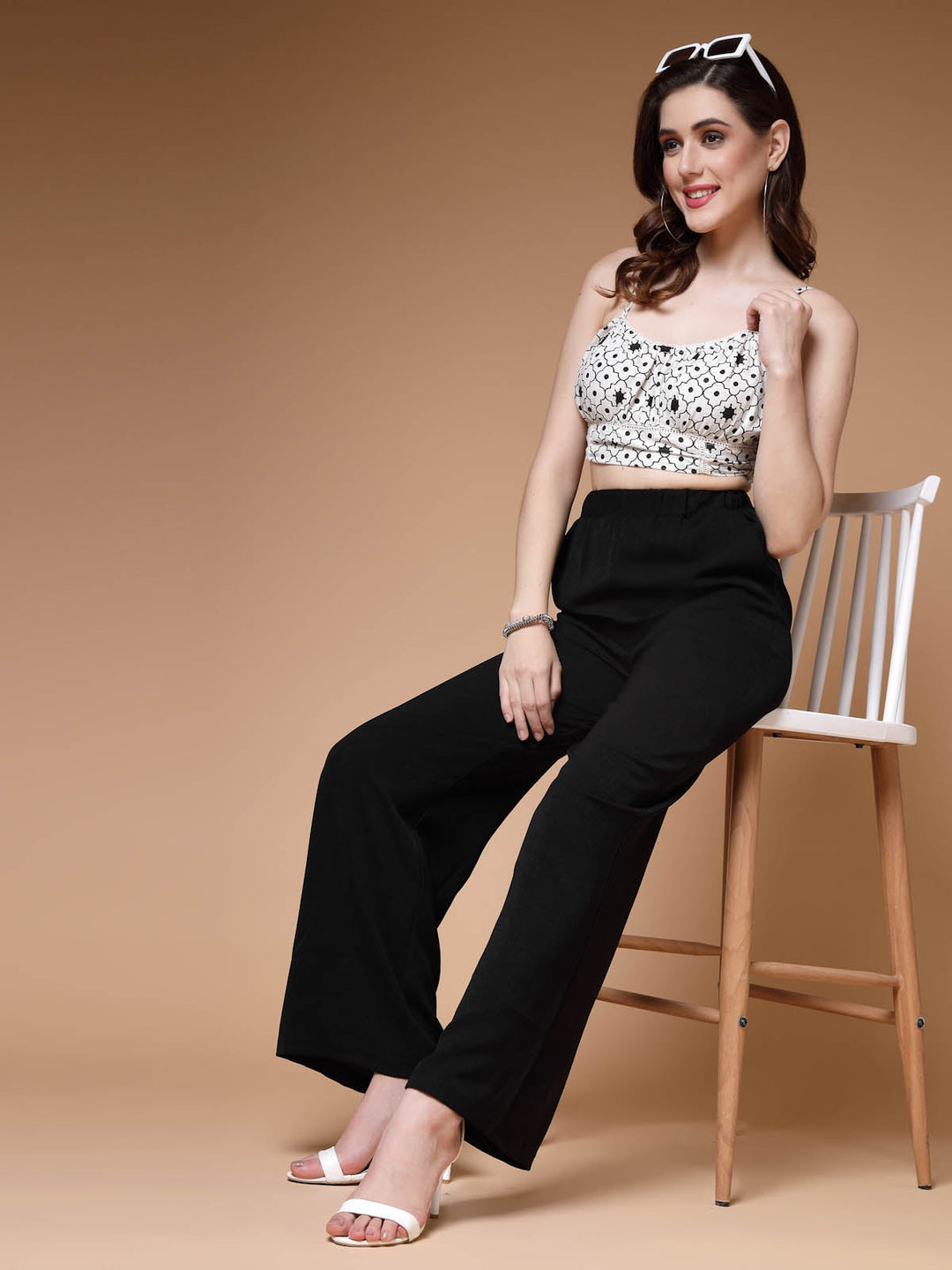 Women Black Mid Rise Plain Parallel Trousers